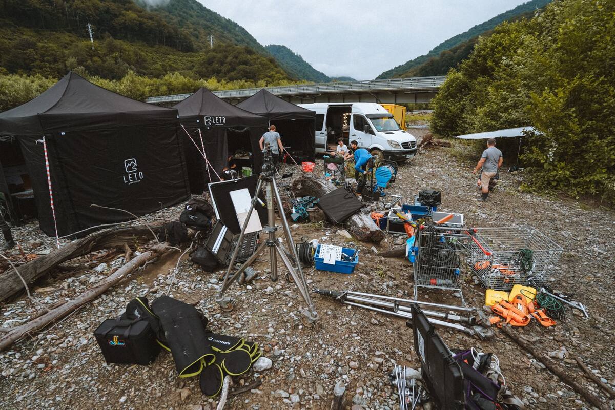 Film production crew and equipment set up on location for a shoot
